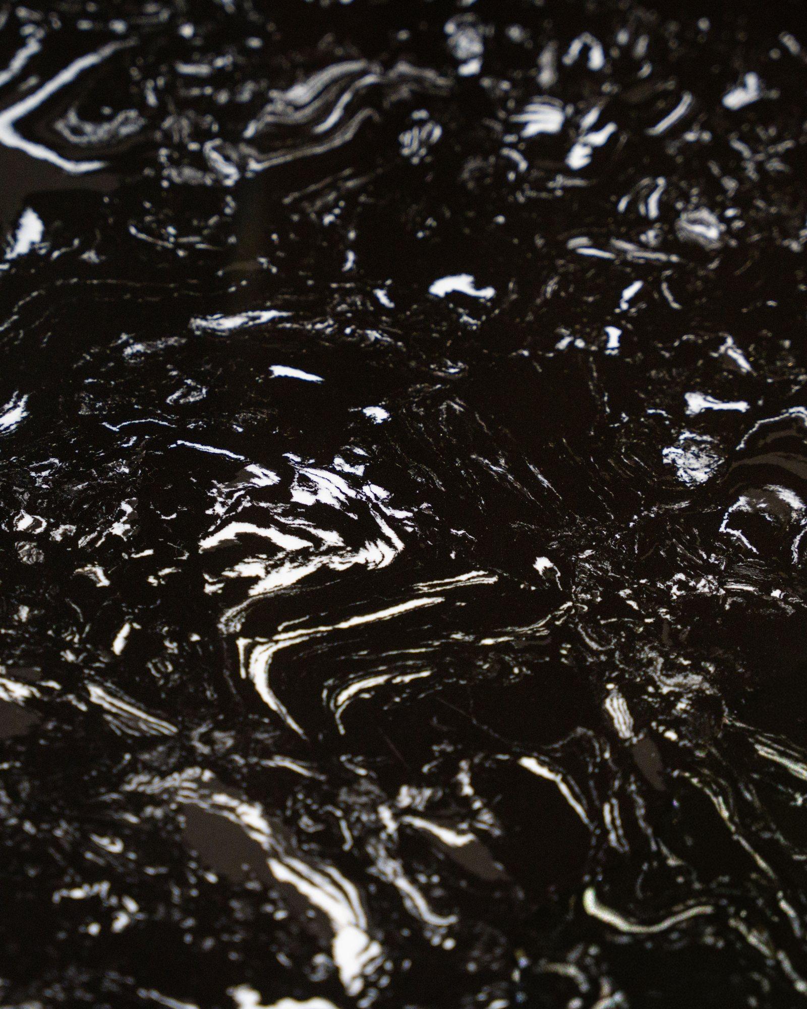 Figured black marble, close.